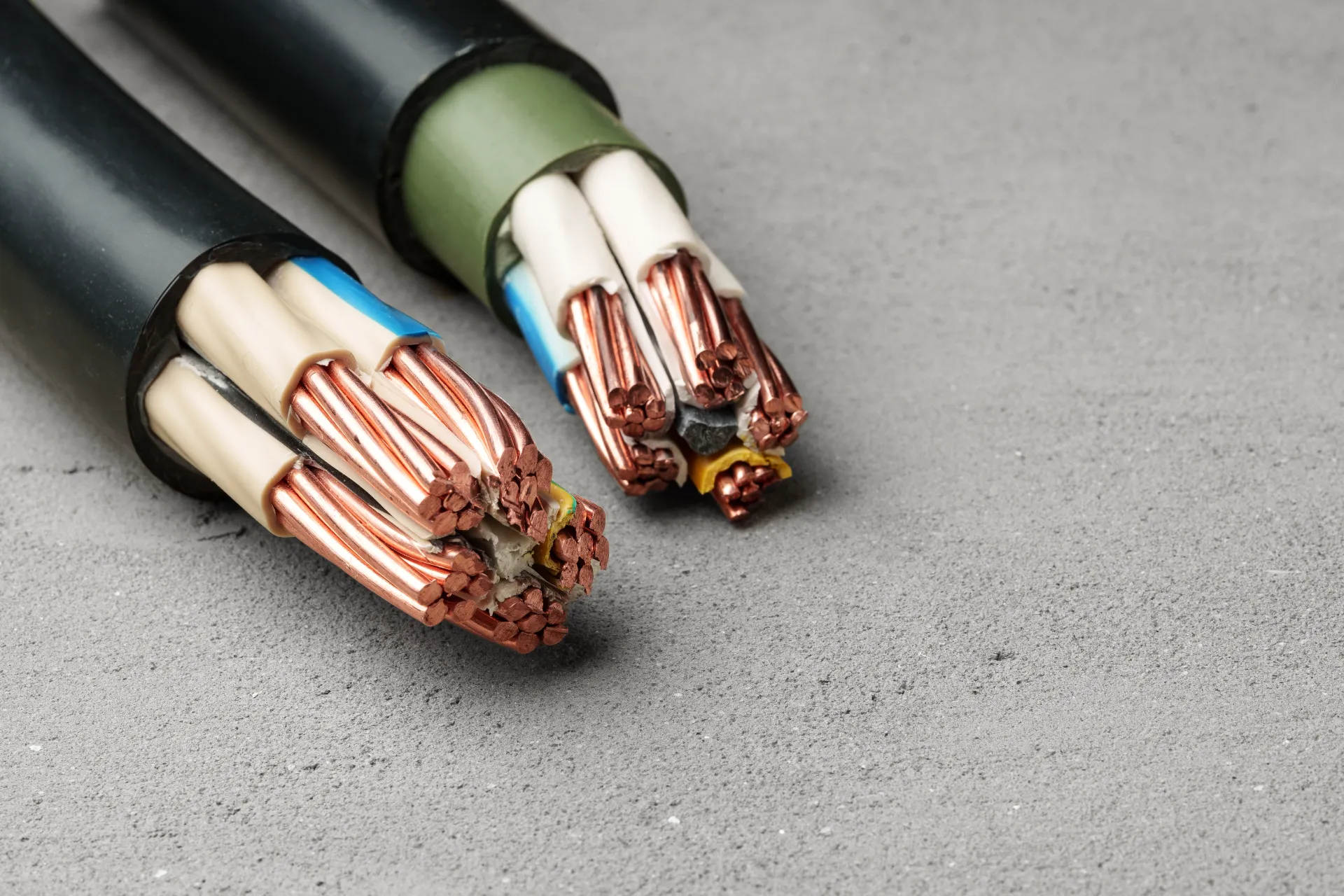 different-types-of-electrical-wires-on-gray-concre-2025-02-25-02-55-45-utc